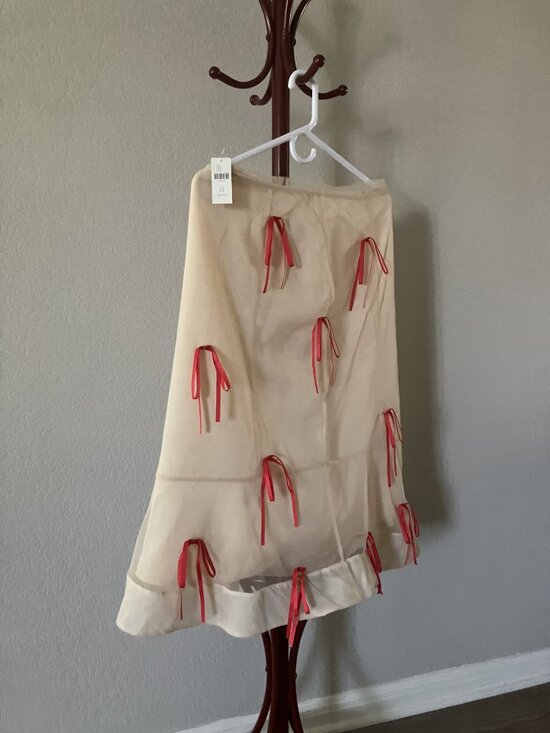 Anthropology Dresses & Skirts - Cute Beige Bow Skirt